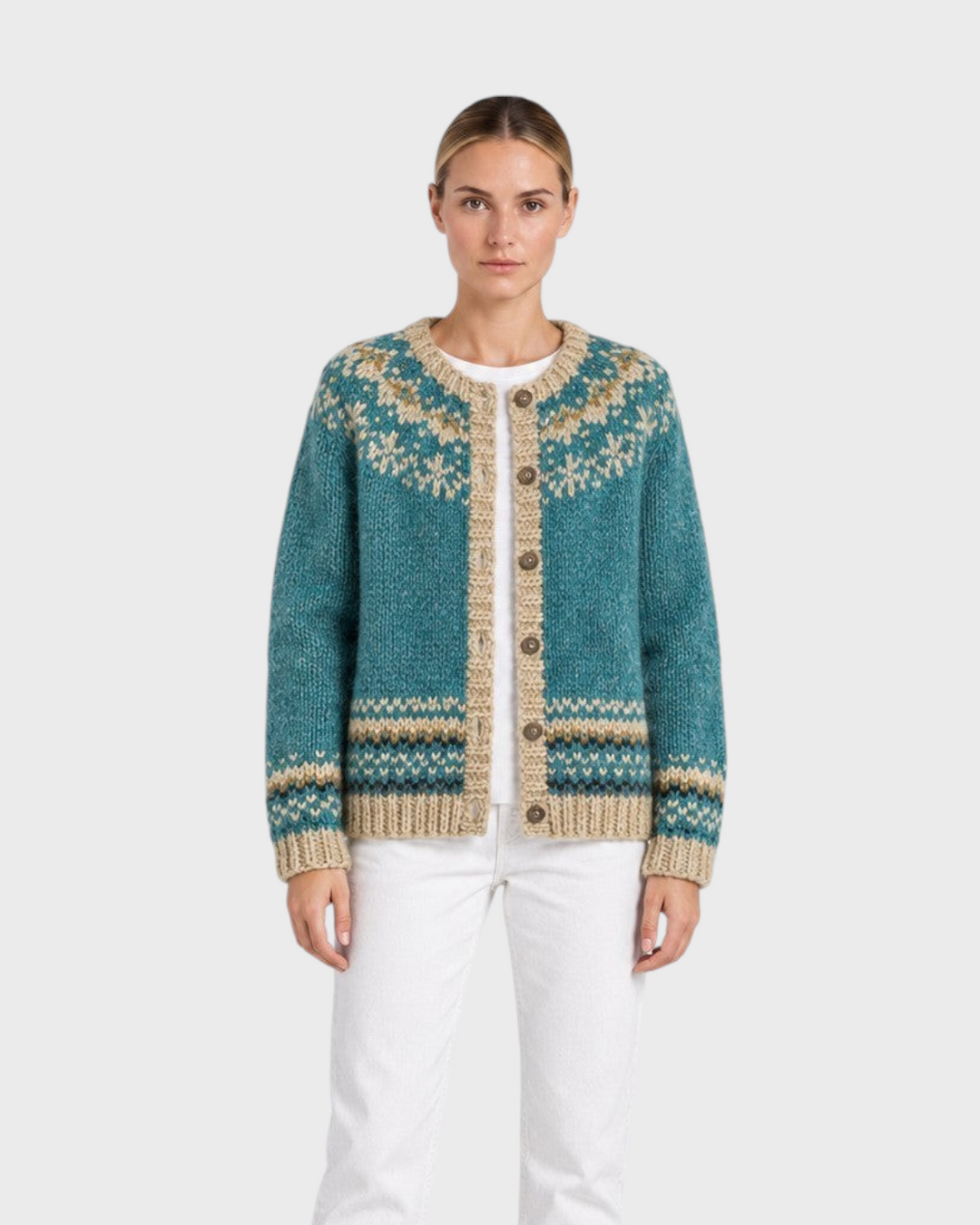 Luna Moda Giada cardigan in teal with beige Nordic pattern, button-up front, worn by a model with white jeans.