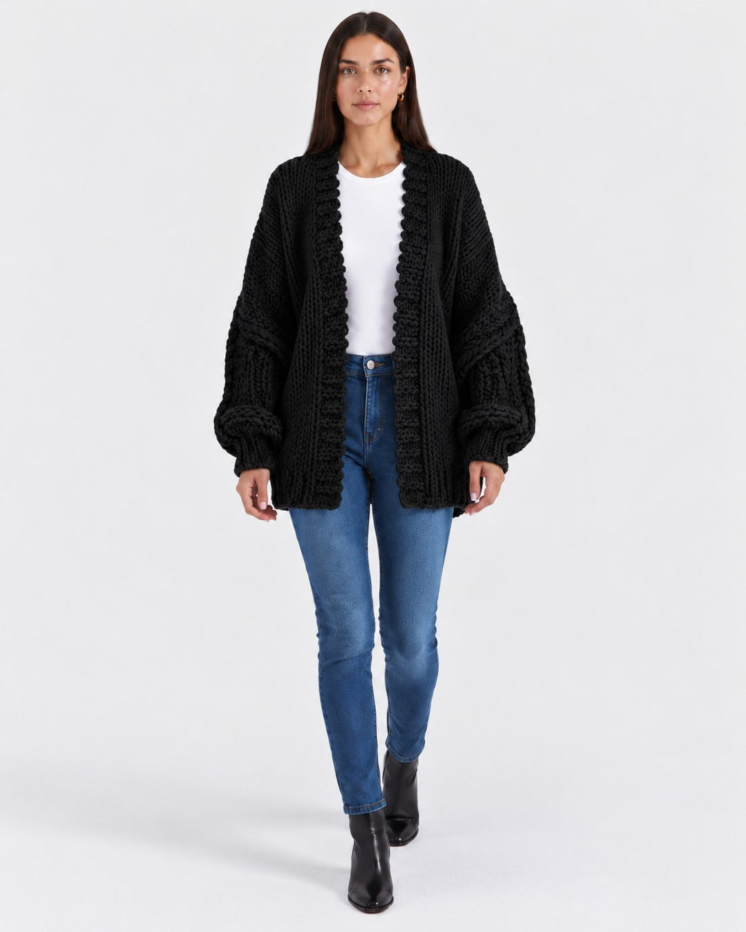 Luna Moda Ginevra black oversized chunky knit cardigan worn by a model with blue jeans and a white t-shirt