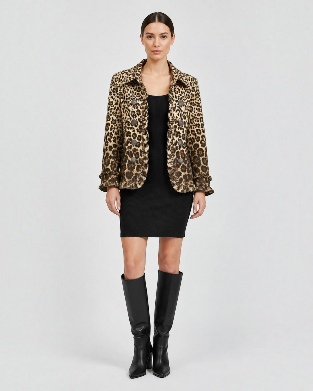 Luna Moda Giuliana leopard print jacket with ruffled trim and vintage buttons worn over a black dress and boots