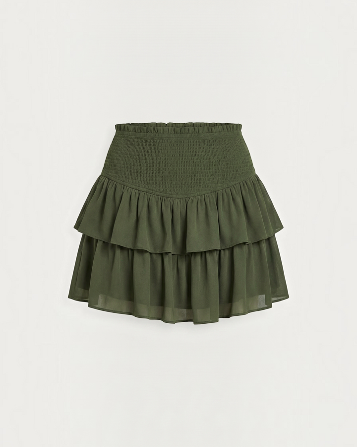 Luna Moda Grace olive green mini skirt with a high-waisted smocked waistband and layered ruffled hem.