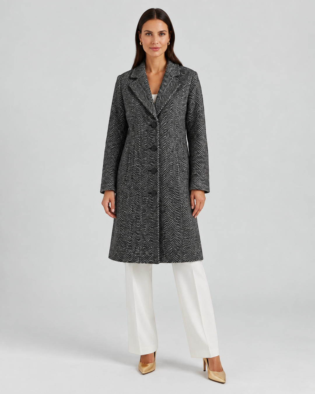Luna Moda ANNALENA long grey herringbone wool-blend coat with lapels worn by a model with white trousers