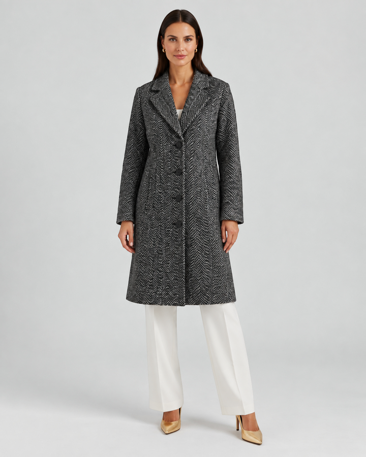 Luna Moda ANNALENA long grey herringbone wool-blend coat with lapels worn by a model with white trousers