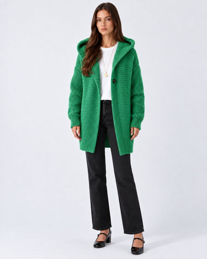 Luna Moda Elena green hooded knit cardigan worn by a model with black jeans and heels