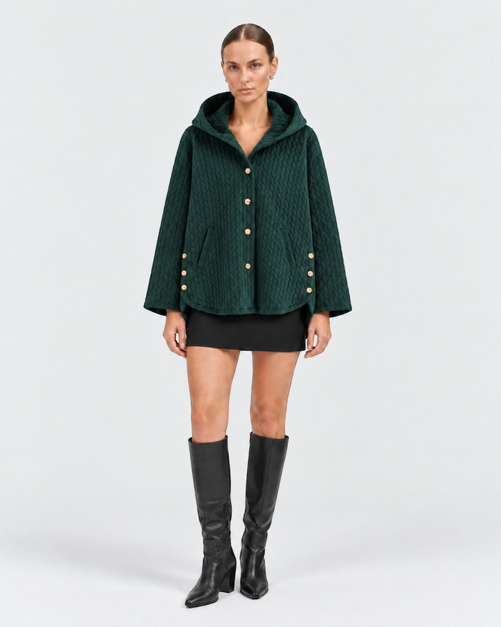 Luna Moda dark green quilted hooded jacket with decorative side buttons worn by a model with black boots