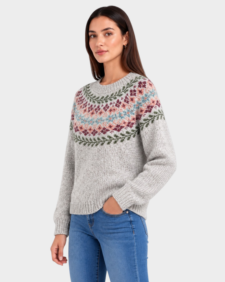Luna Moda handmade grey wool sweater with a colorful floral and geometric jacquard yoke pattern on a female model
