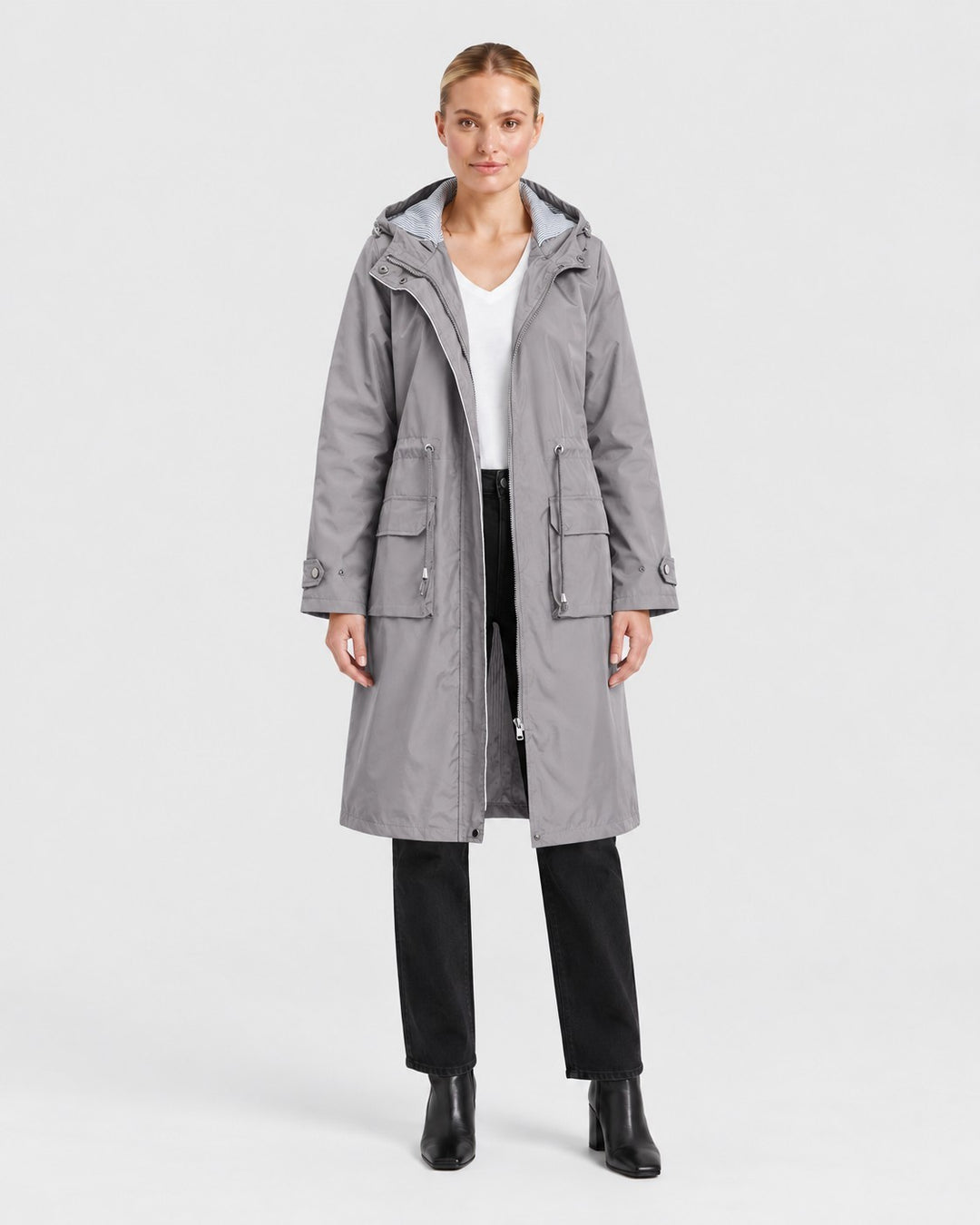 Luna Moda grey lightweight hooded trench coat with front pockets and adjustable features worn by a woman