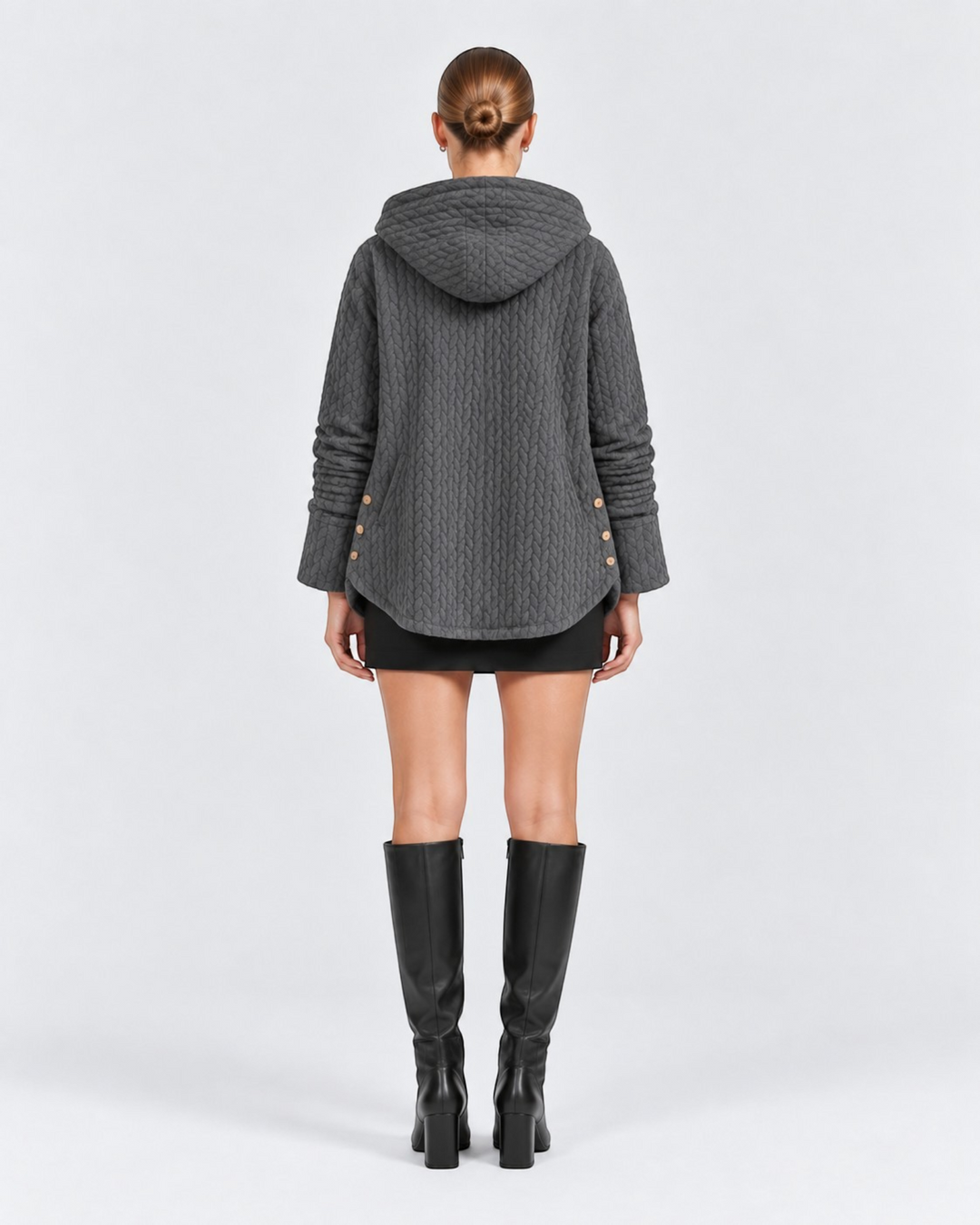 Luna Moda grey quilted hooded jacket with decorative side buttons worn by a model from the back view