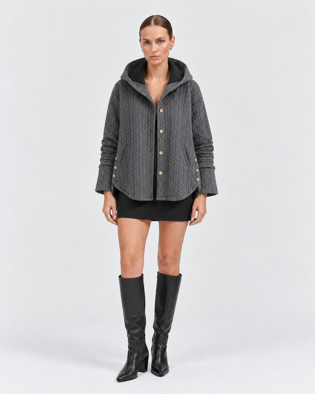 Luna Moda Susanna grey quilted hooded jacket with decorative side buttons worn by a model in a black outfit