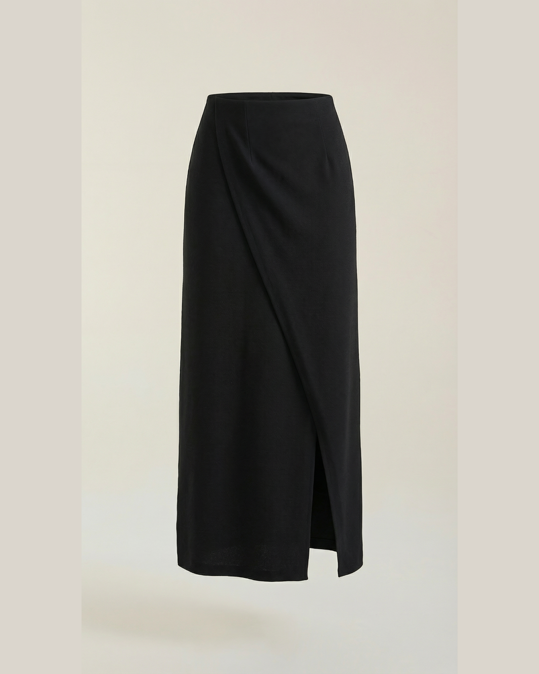 Luna Moda black midi knit skirt with a contemporary wrap-style overlapping front and a clean, feminine silhouette.