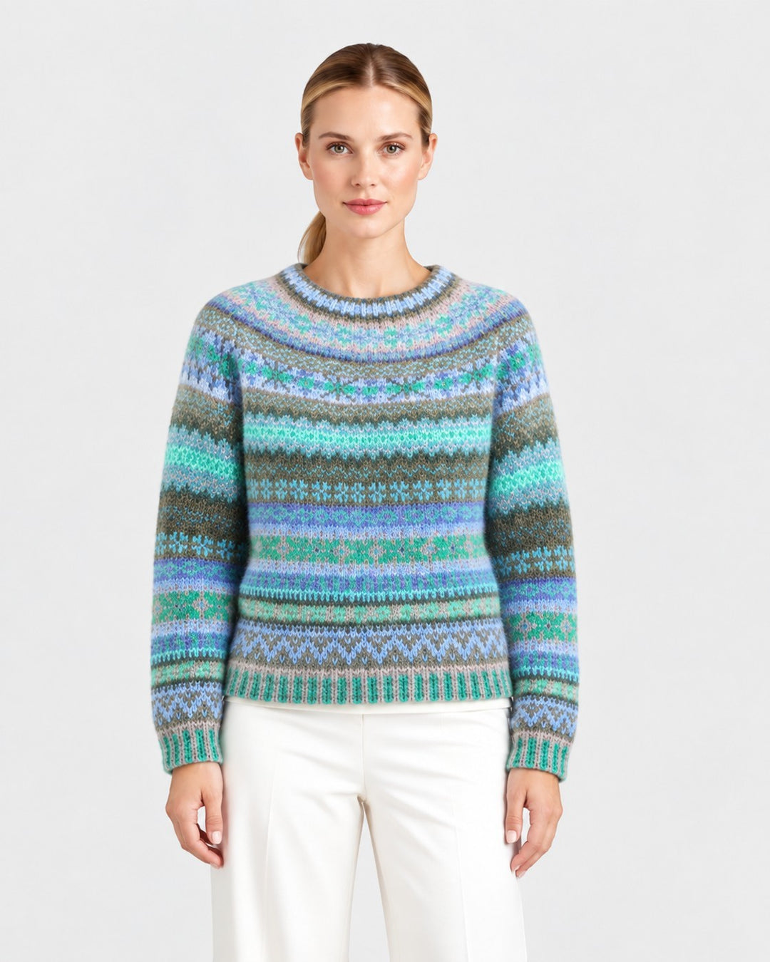 Luna Moda handmade Icelandic sweater featuring a vibrant blue and green gradient striped pattern with intricate motifs