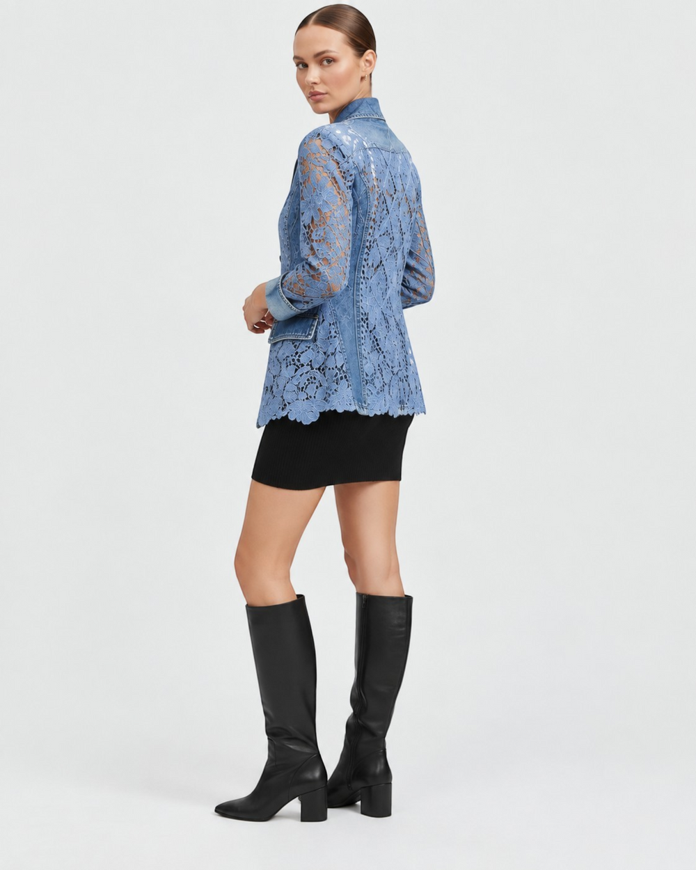 Luna Moda Harper blazer in blue lace with denim accents, worn by a model with a black skirt and knee-high boots.