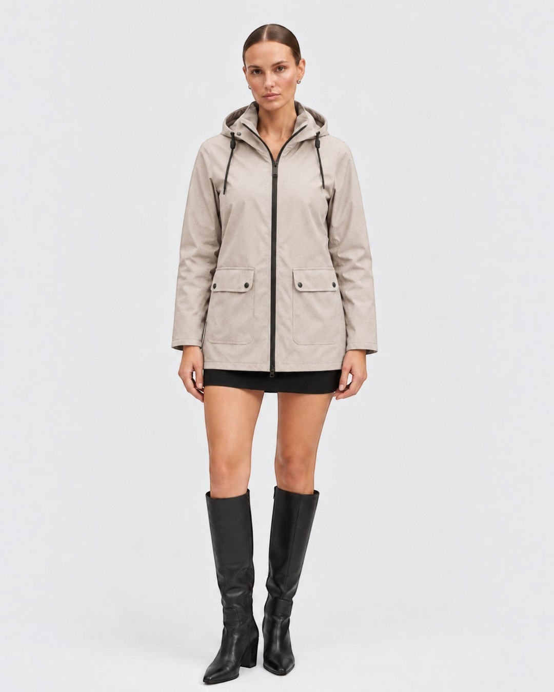 Luna Moda IOLANDA beige breathable waterproof jacket with hood, front zipper, and flap pockets on a model