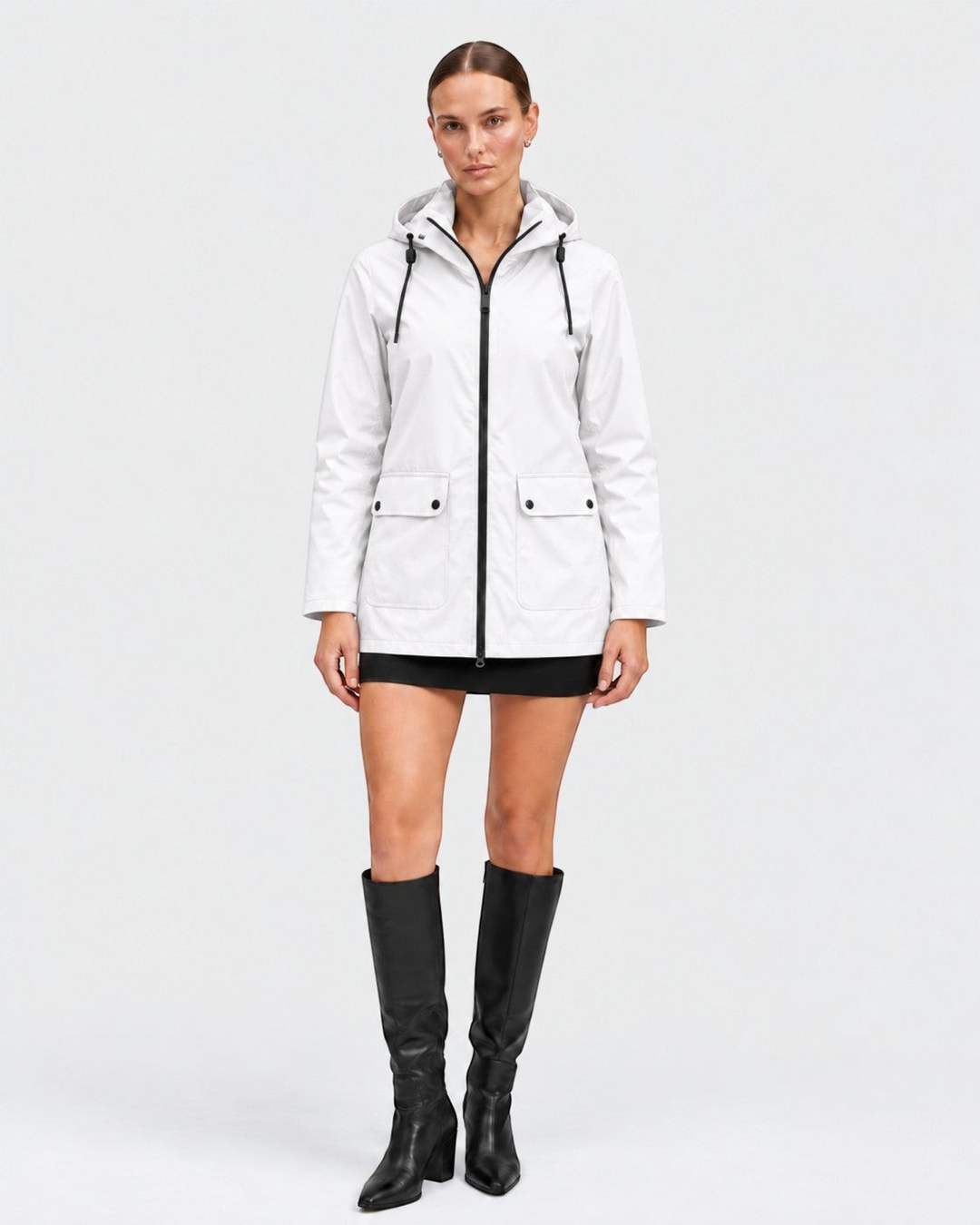 Luna Moda IOLANDA white waterproof breathable jacket with hood and black zipper worn by a model