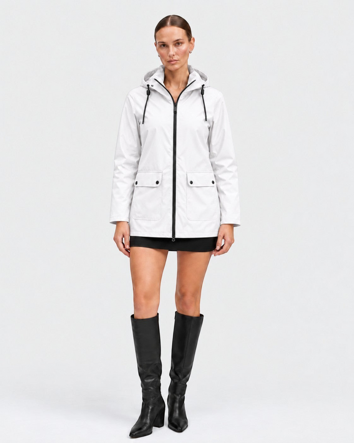 Luna Moda IOLANDA white waterproof breathable jacket with hood and black zipper worn by a model