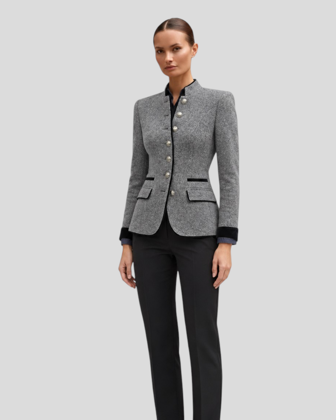 Luna Moda Isabel grey wool-blend short coat with silver buttons and black trim worn by a model