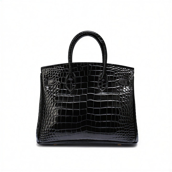 Luna Moda Ludovica black structured tote bag in glossy crocodile-embossed leather with gold hardware and top handle.