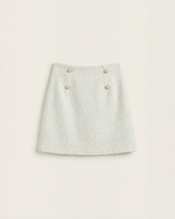 Luna Moda Isla white tweed mini skirt with metallic threads and decorative gold buttons in an A-line silhouette.