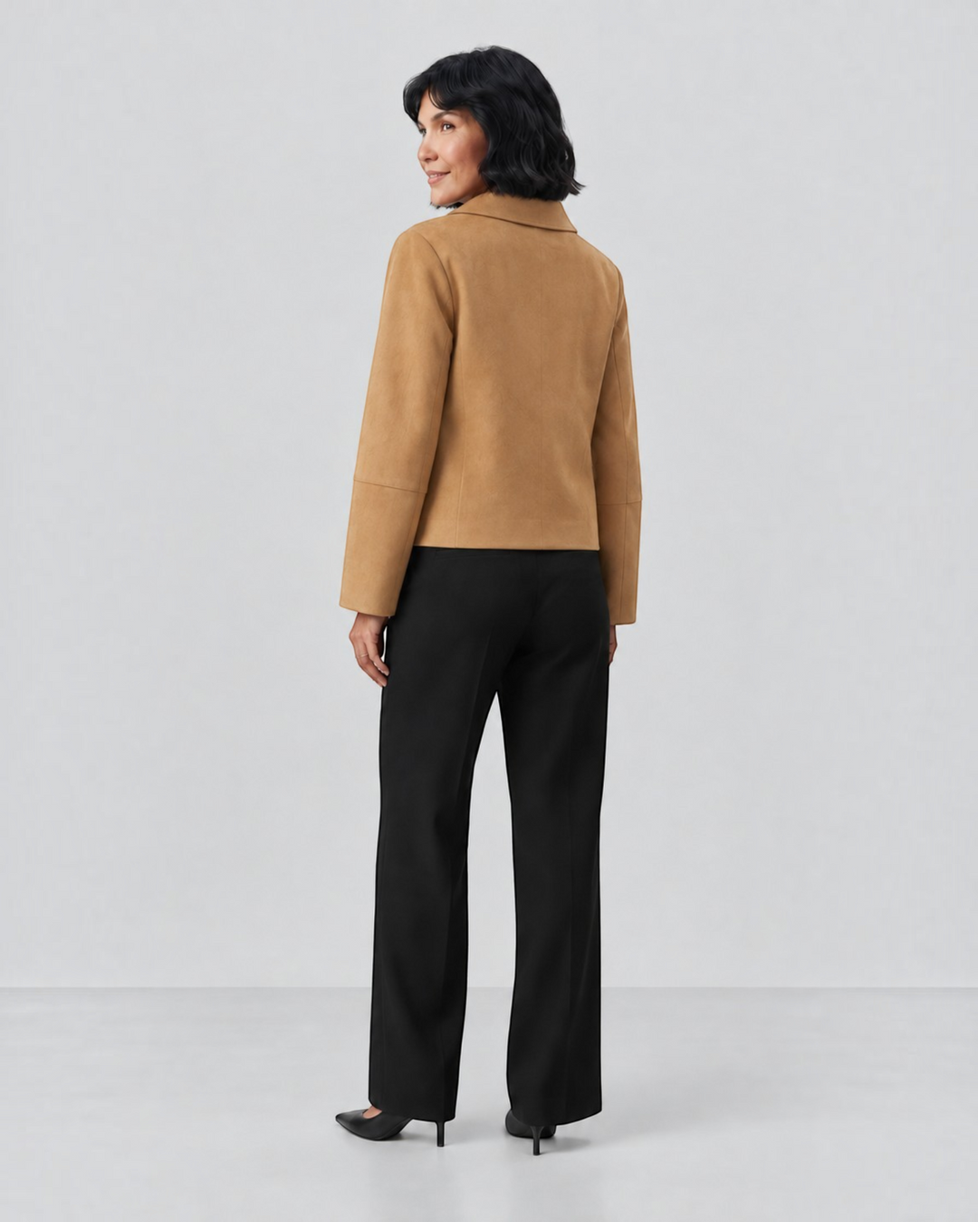 Luna Moda Julie camel cropped jacket worn by a woman with black trousers and heels, back view