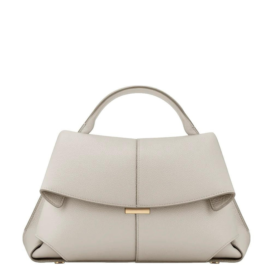 Luna Moda Lara beige leather handbag with a minimalist design, top handle, and elegant gold-tone hardware detail.