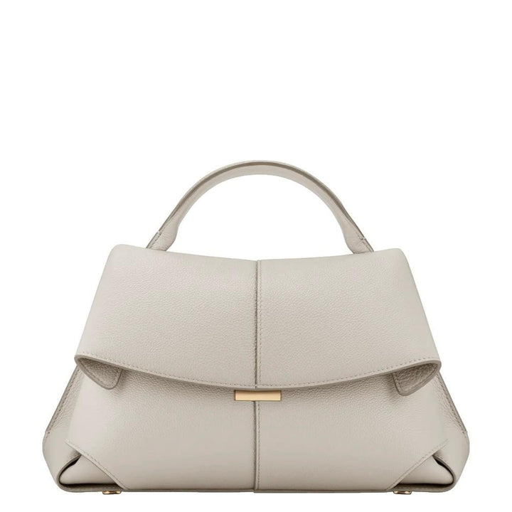 Luna Moda Lara beige leather handbag with a minimalist design, top handle, and elegant gold-tone hardware detail.