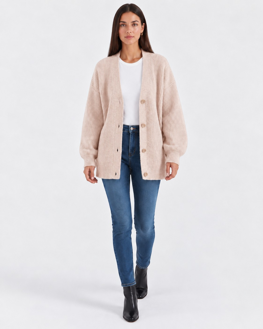 Luna Moda Laura beige cashmere V-neck cardigan worn by a model with blue jeans and black boots