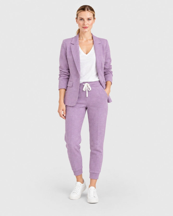 Luna Moda lavender blazer and jogger pant set worn by a model with a white t-shirt and sneakers