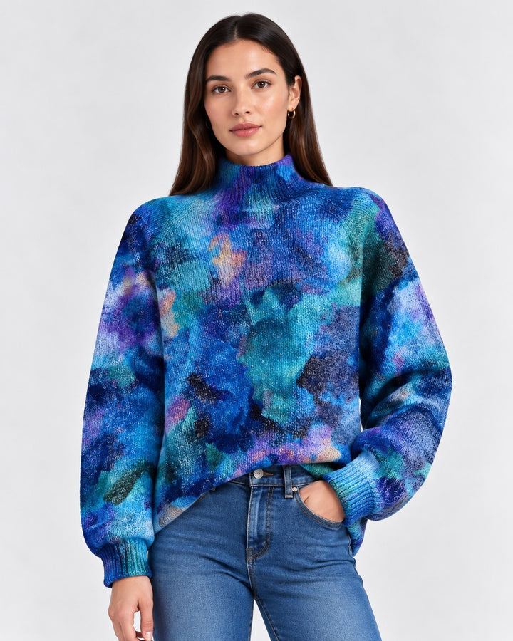 Luna Moda Lavinia turtleneck sweater with a vibrant blue and purple abstract floral print and ribbed high neck