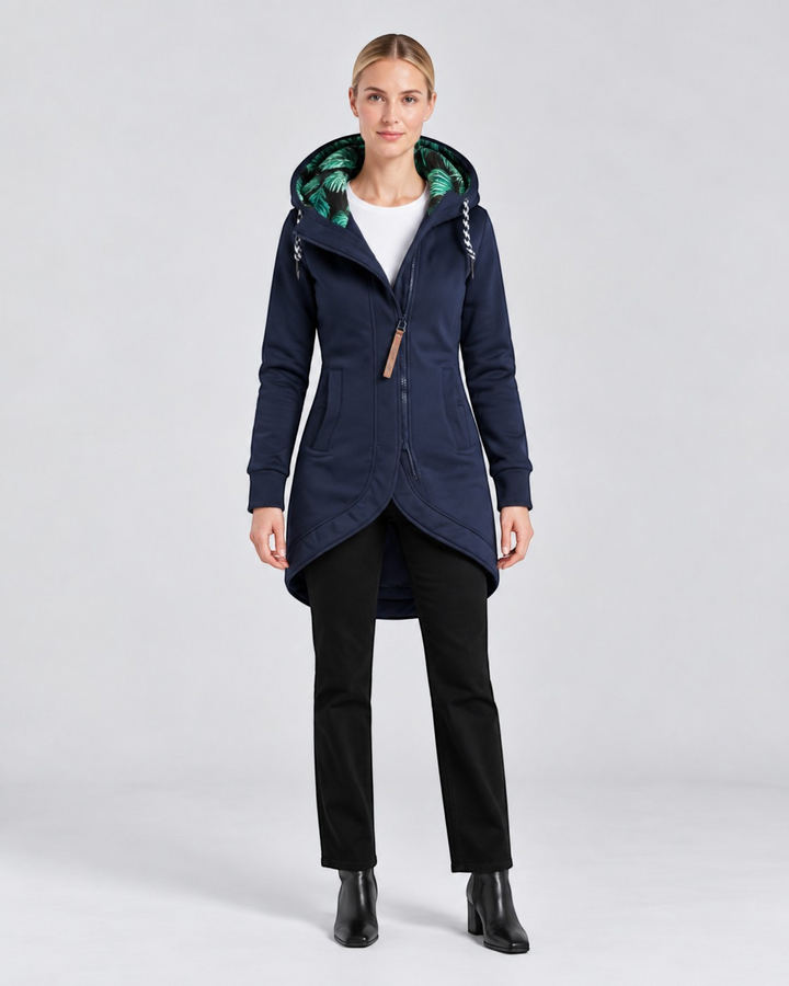 Luna Moda LEONILDA navy blue fitted coat with a green tropical print hood lining worn by a blonde model
