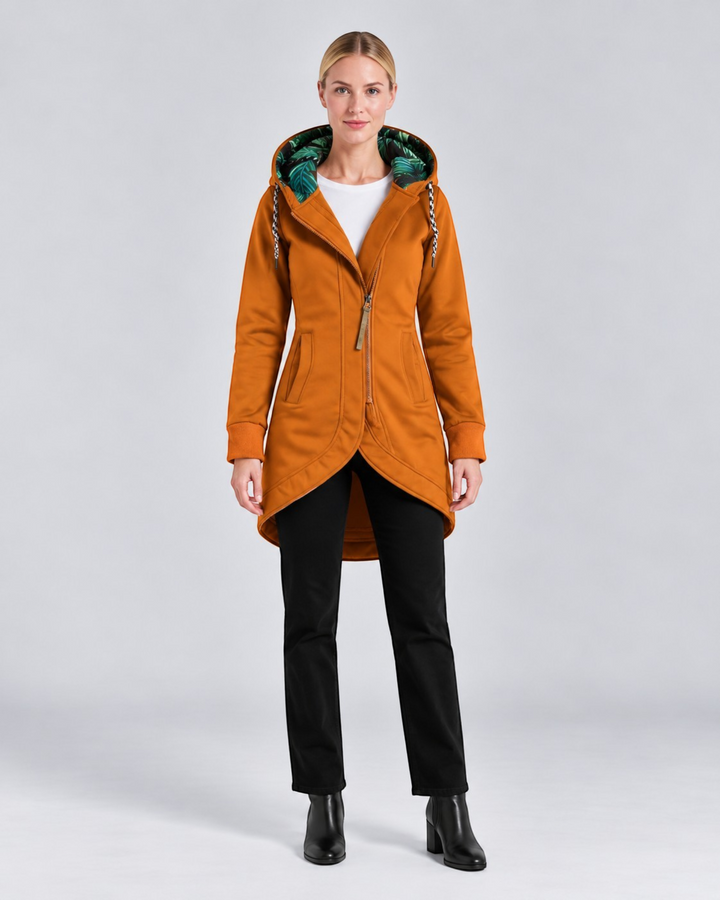 Luna Moda LEONILDA elegant ochre hooded coat with a tropical leaf print lining and asymmetrical zip closure