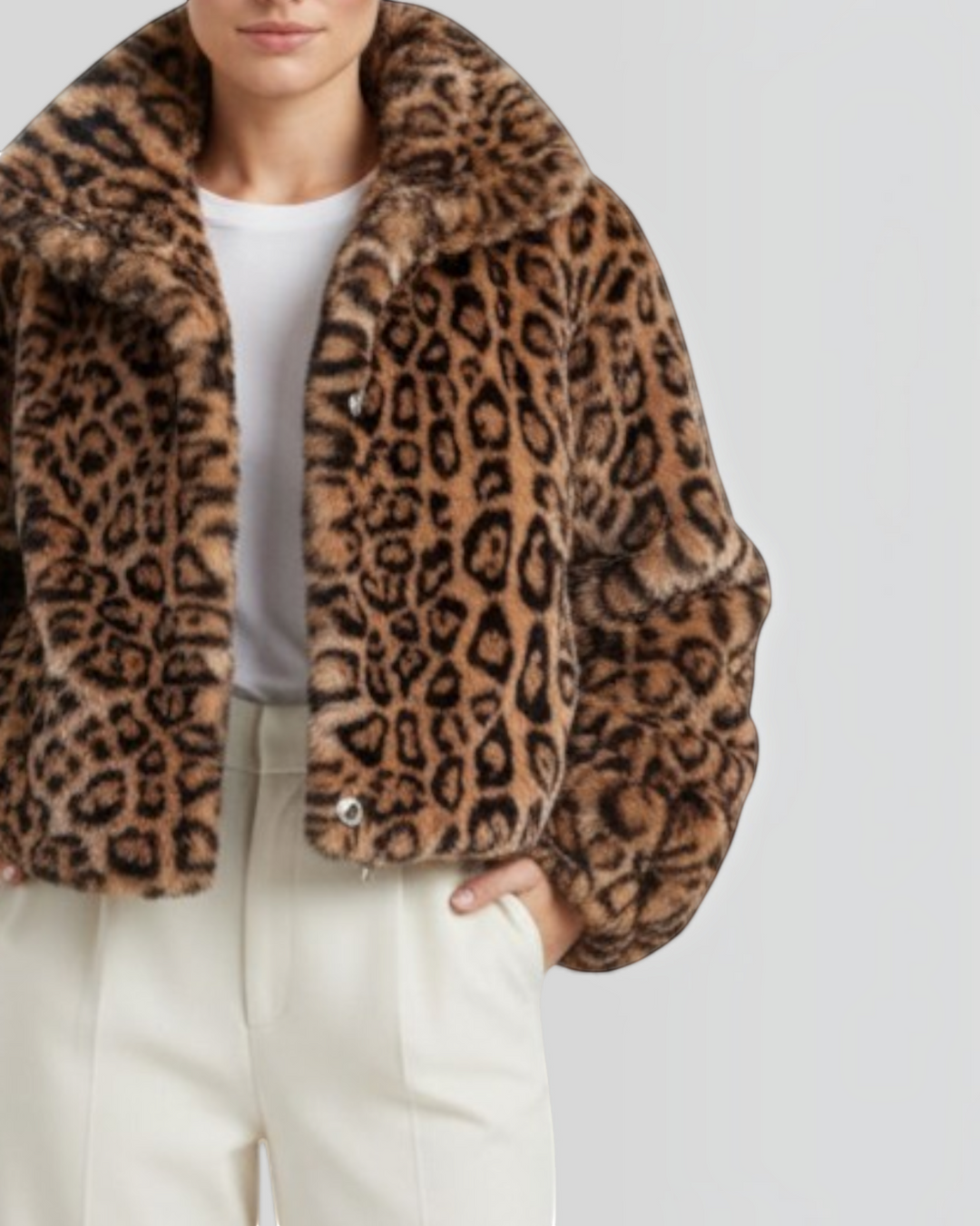 Luna Moda leopard print faux fur cropped jacket worn by a model with white wide-leg trousers and beige heels