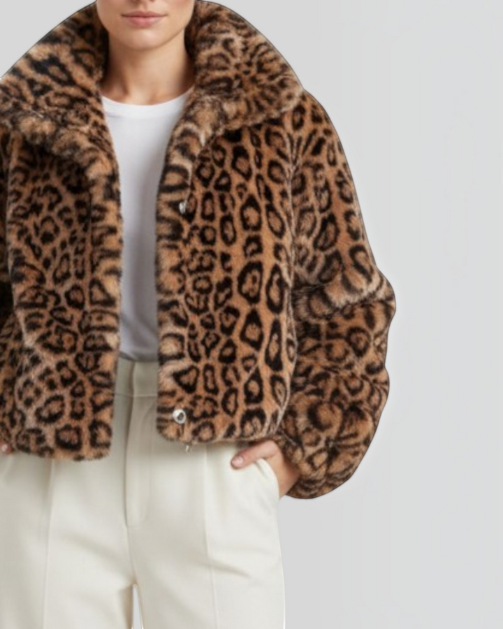 Luna Moda leopard print faux fur cropped jacket worn by a model with white wide-leg trousers and beige heels