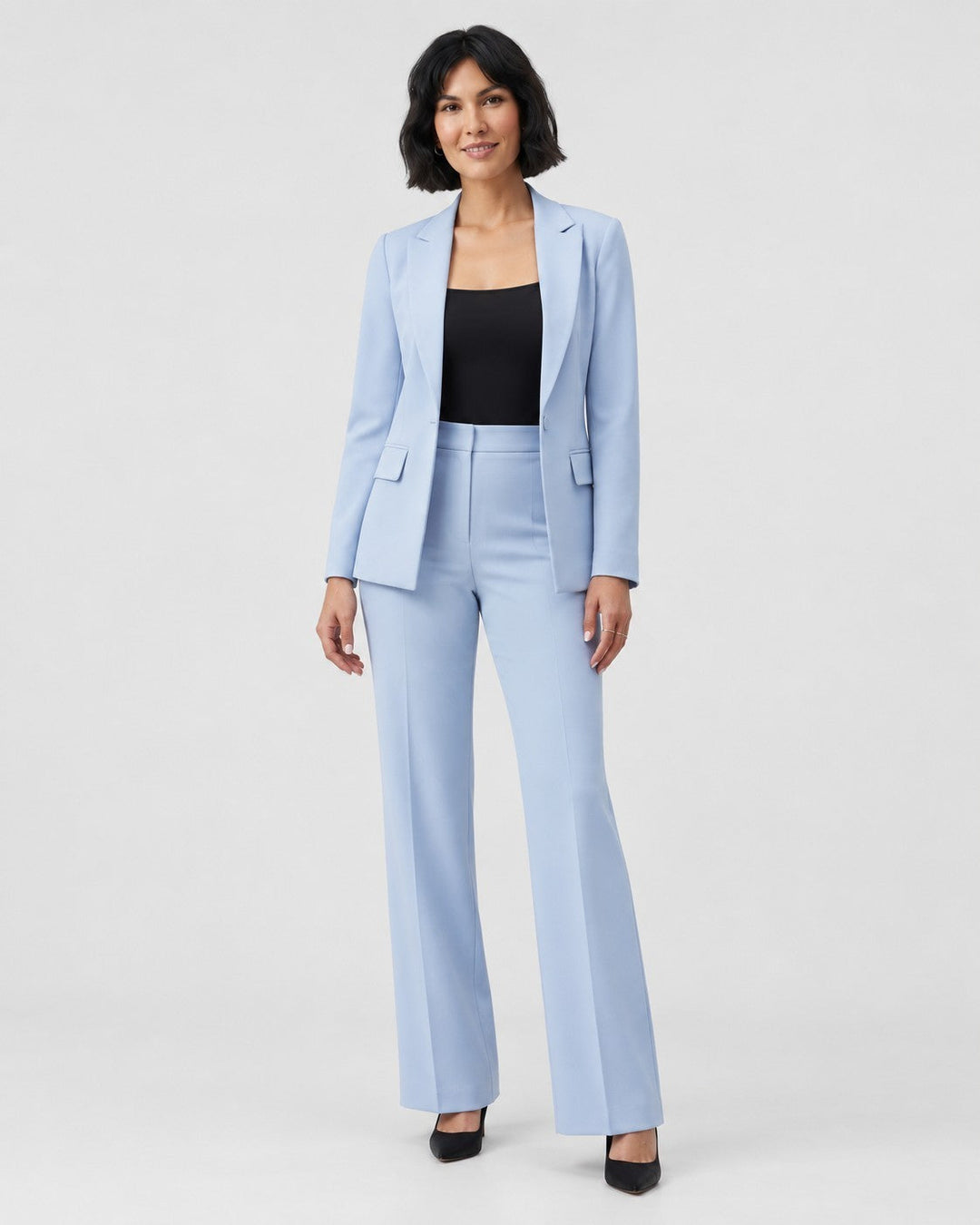 Luna Moda Sofia tailored light blue suit with a structured blazer and matching trousers worn by a woman