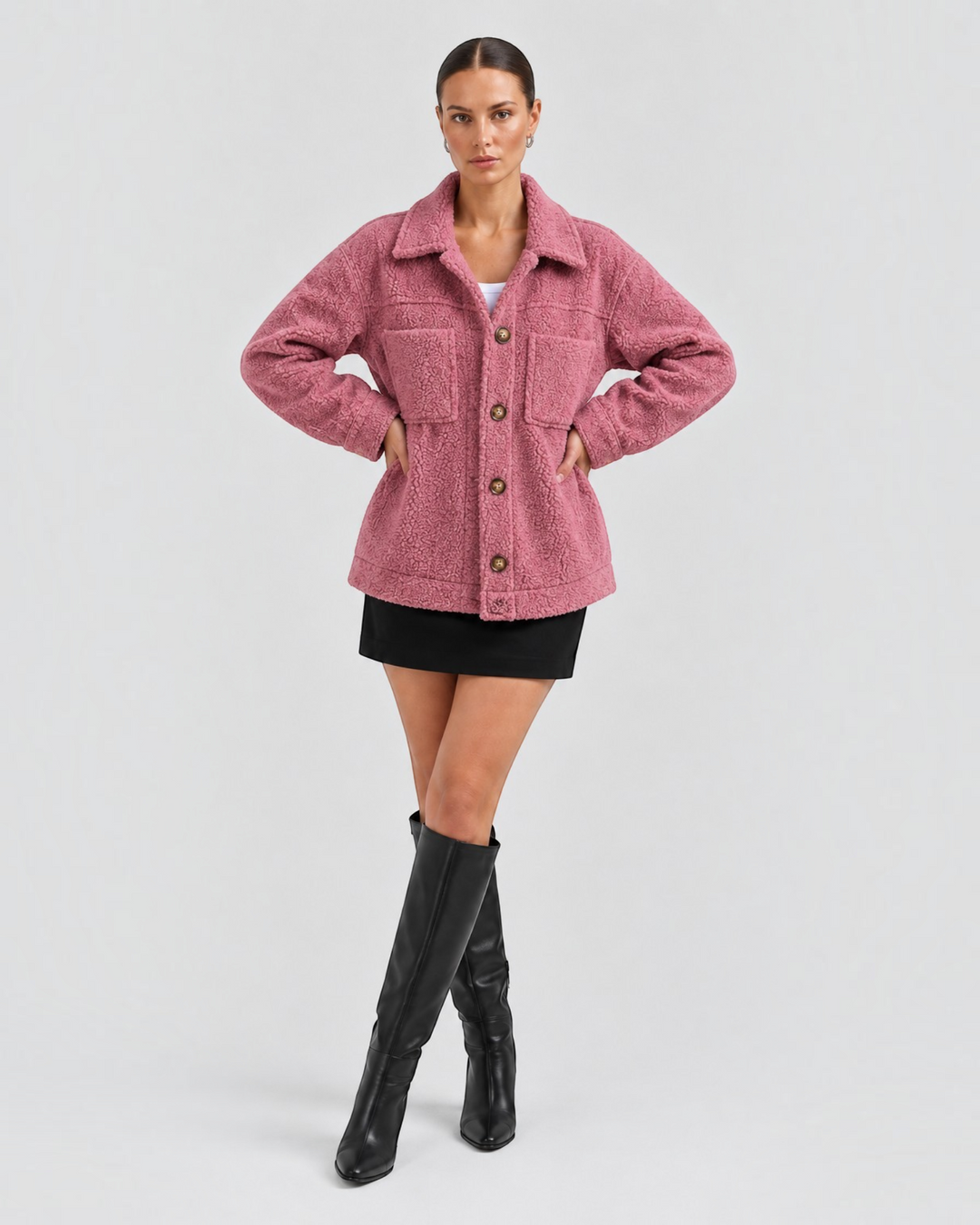 Luna Moda Liliana pink teddy fleece jacket with lapel collar, button front, and chest pockets worn by a model