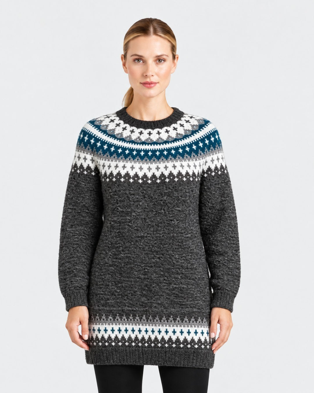 Luna Moda long grey knitted sweater with a Nordic-inspired pattern in white and blue, worn by a female model.