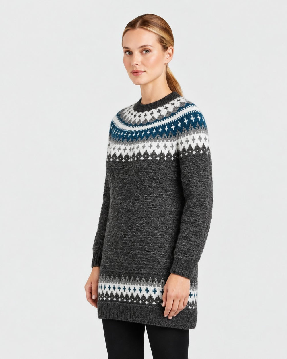 Luna Moda long grey sweater featuring a traditional Nordic pattern in white and blue, worn by a model.