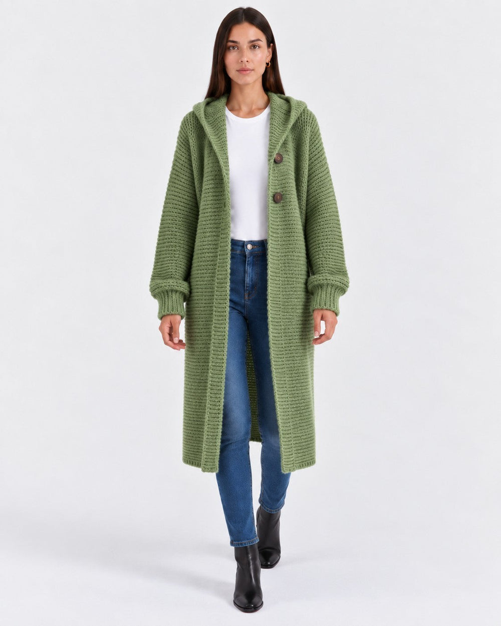 Luna Moda long olive green knit cardigan with a hood and front buttons worn by a model with jeans and boots