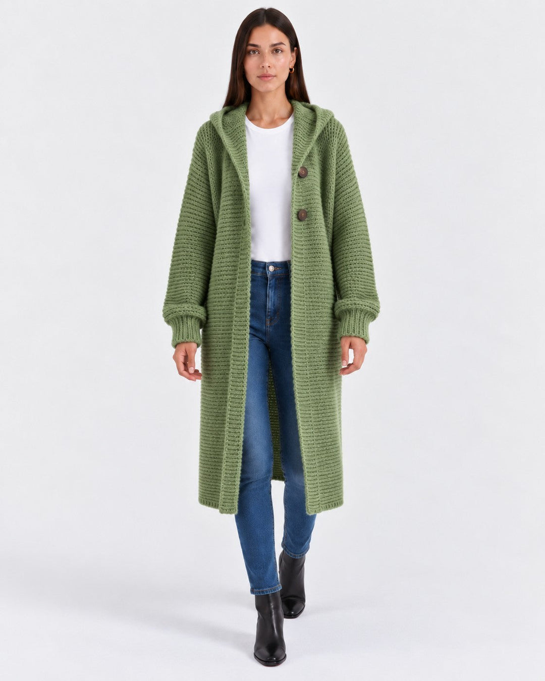 Luna Moda long olive green knit cardigan with a hood and front buttons worn by a model with jeans and boots
