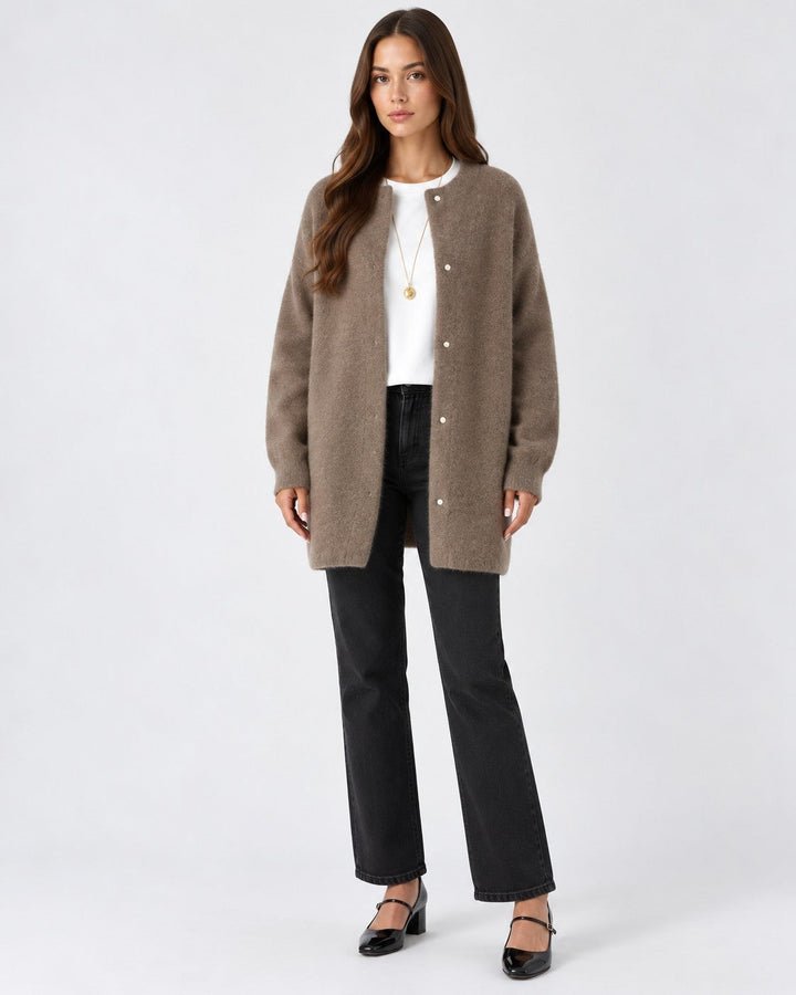 Luna Moda long taupe soft knit cardigan worn by a woman with a white top and black trousers