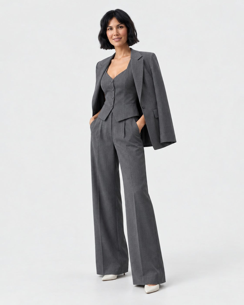 Luna Moda Marcella three-piece grey suit featuring a tailored blazer, buttoned vest, and wide-leg trousers on a model