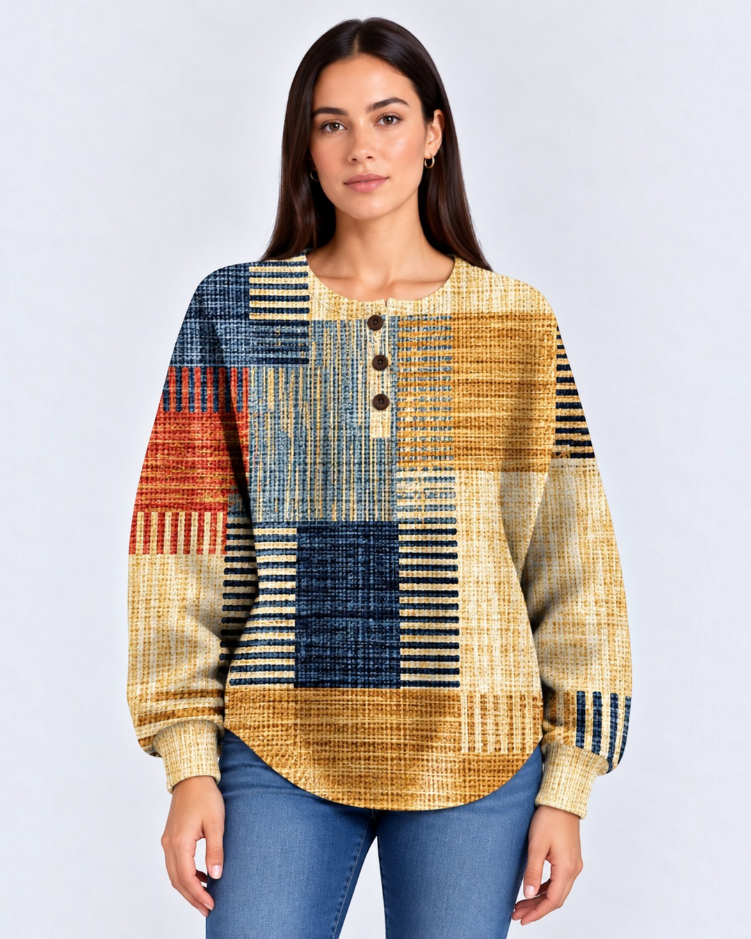 Model wearing a Luna Moda Marcella waffle knit Henley sweater with a multi-colored geometric block pattern.