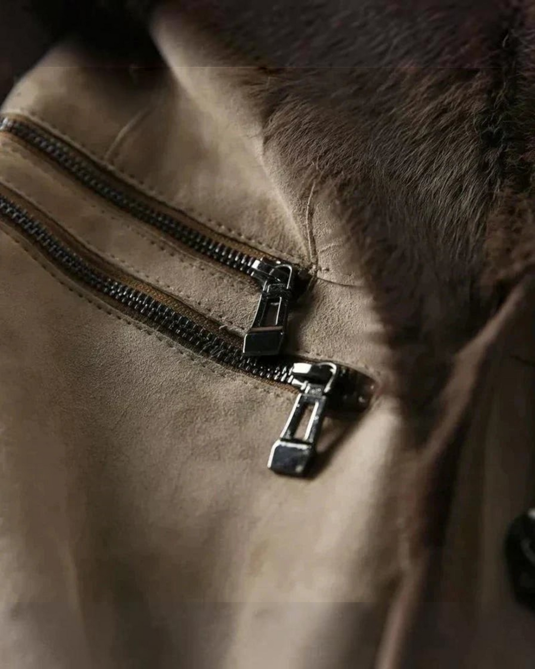Luna Moda lambskin coat in beige with a soft fur collar and detailed metal zipper pockets