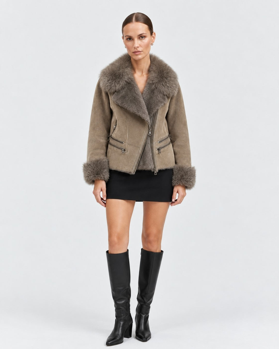 Luna Moda Marianna taupe lambskin coat with a soft fur collar and cuffs worn by a model with a black skirt and boots