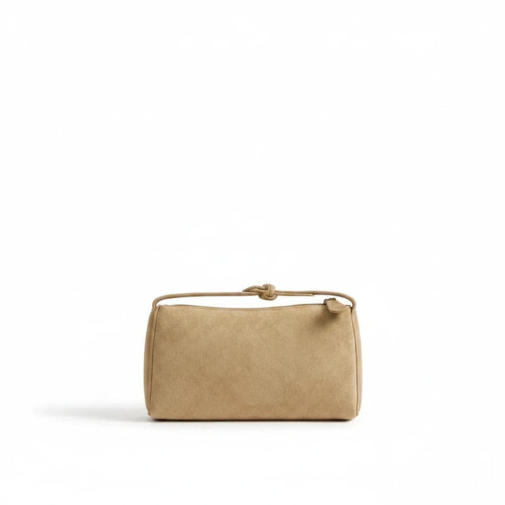 Luna Moda Marisa beige suede shoulder bag with a knotted strap detail on a clean white background.