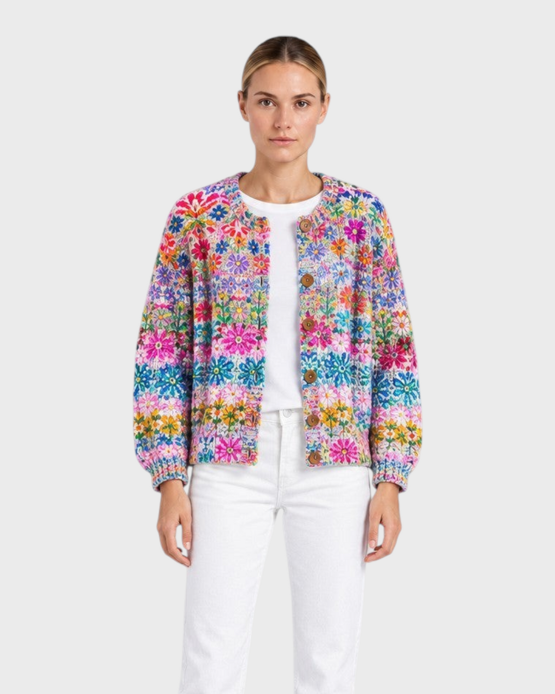 Luna Moda Marta cardigan featuring a vibrant floral patchwork design, soft padded fabric, and rustic wooden buttons.