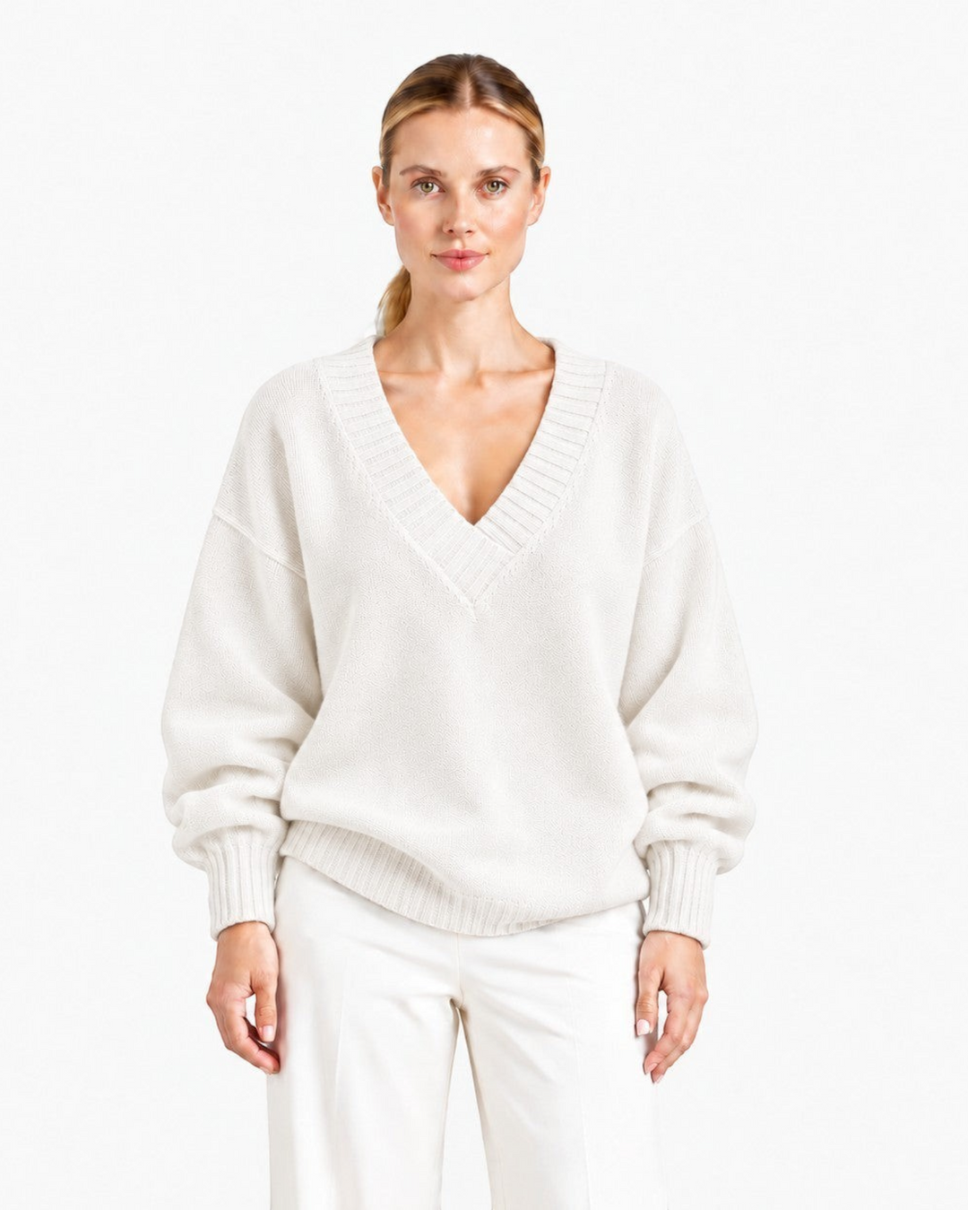 Luna Moda Nadia relaxed fit cream cashmere blend sweater with a deep V-neck worn by a model