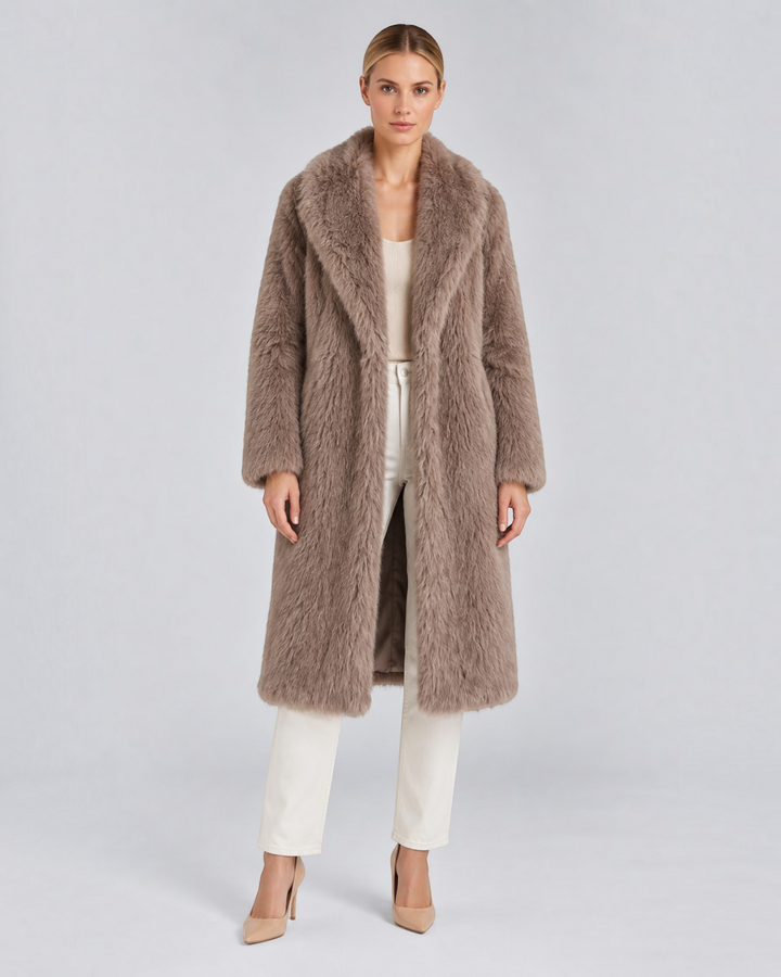 Luna Moda Narcissa long taupe faux fur coat with oversized lapels worn by a model on a neutral background