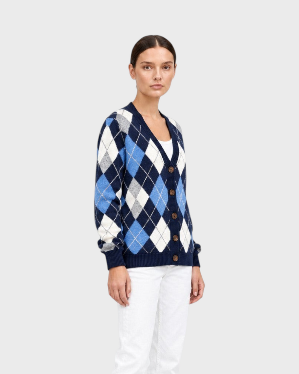Luna Moda Rebecca argyle cardigan in blue and white with button front, worn by a model with white jeans and boots.