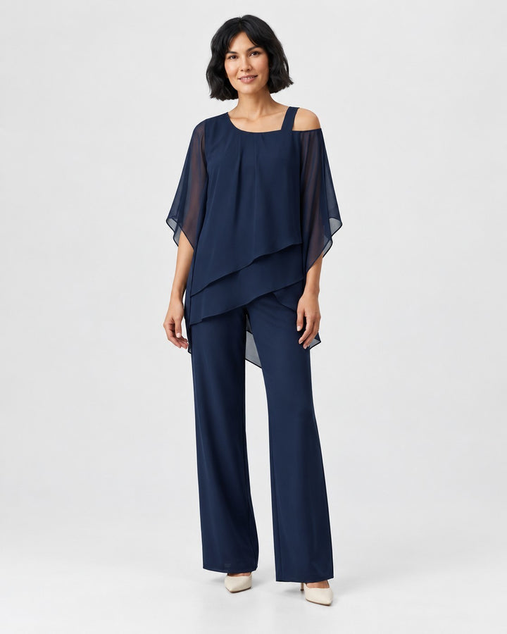 Luna Moda navy blue chiffon two-piece set with a modern layered top and wide-leg trousers on a female model