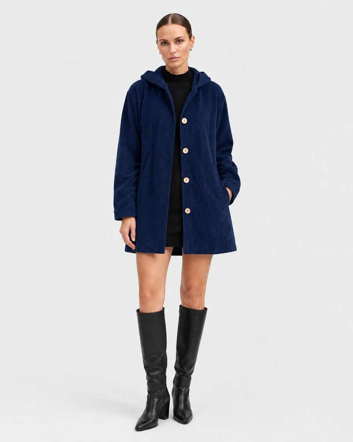 Luna Moda navy blue corduroy hooded jacket with front buttons worn by a model with black boots