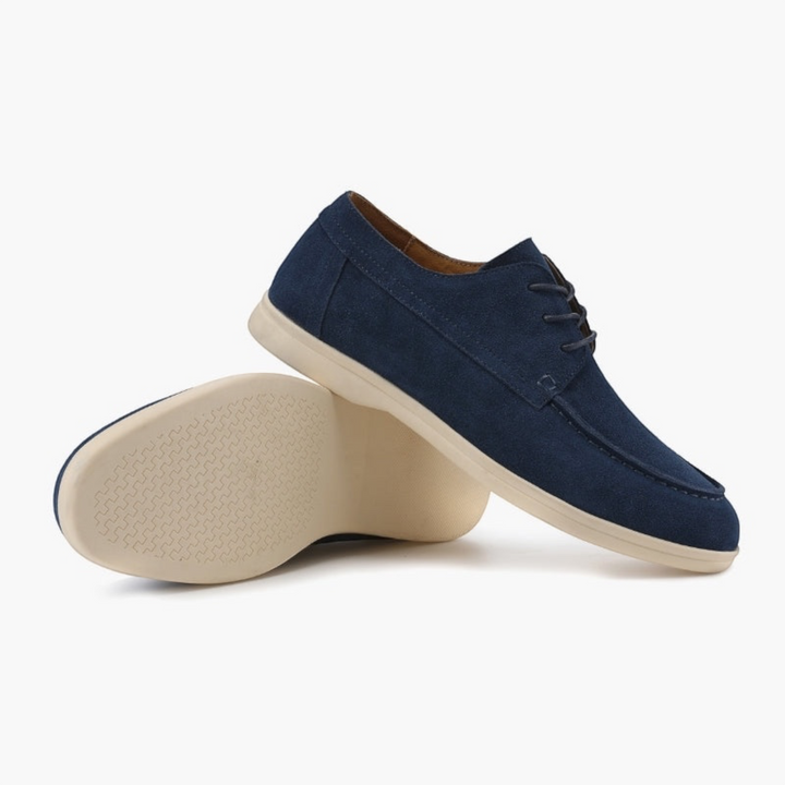 Luna Moda navy blue premium suede lace-up shoes with a lightweight beige sole, shown from a side angle.